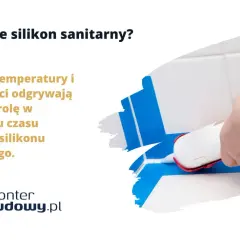 Dłoń z pistoletem do silikonu uszczelnia fugę między białymi płytkami.